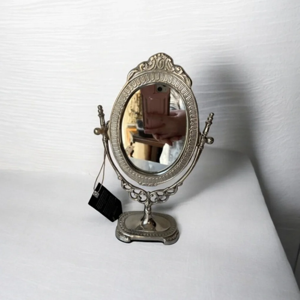 Silver tone metal antique style vanity mirror adjustable free standing 10” high